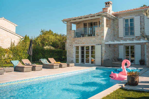 Lovely back garden pool and pool floats in a back garden pool. No people.